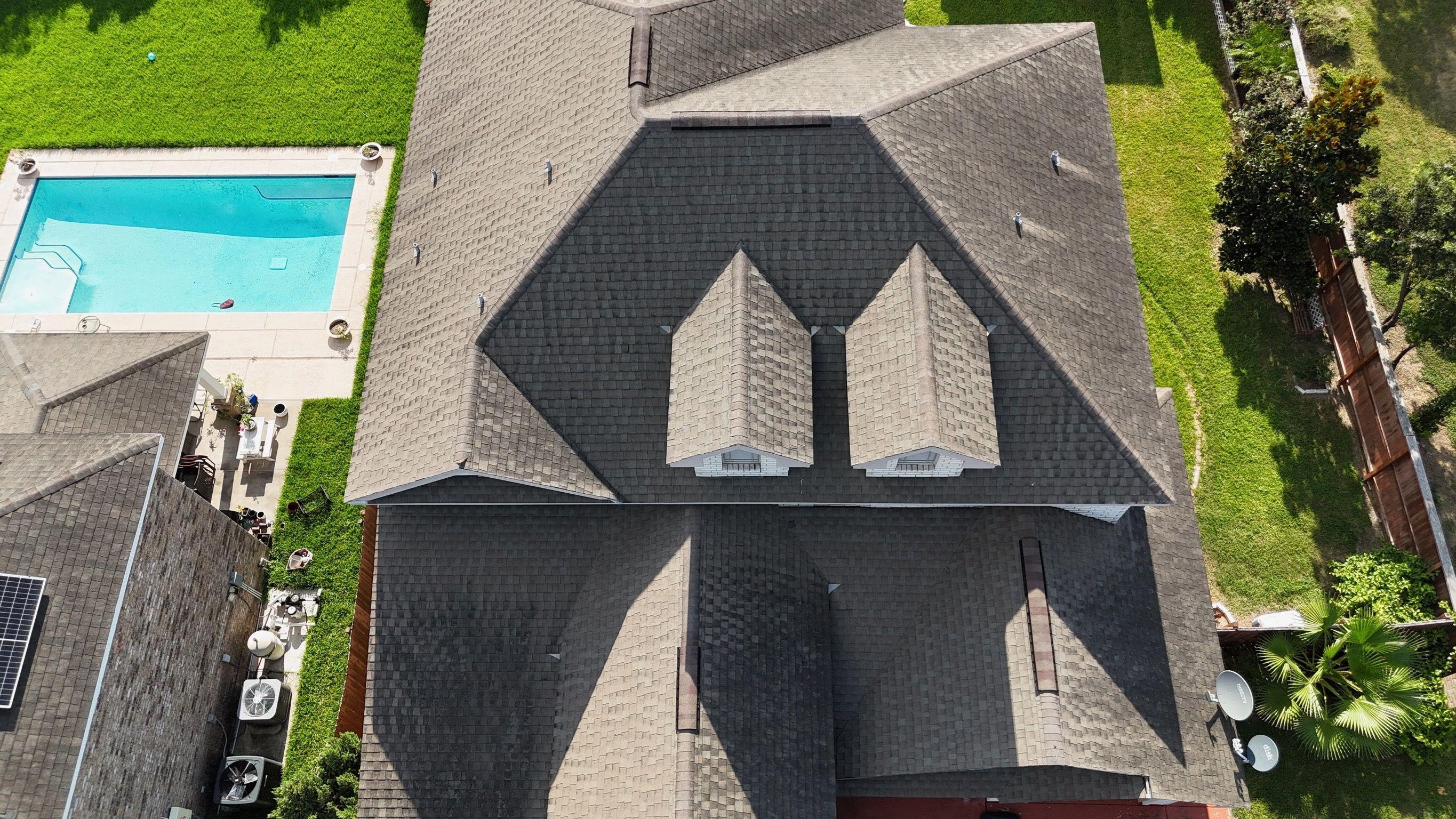 Insurance roof claim check issued to homeowner with mortgage company listed.