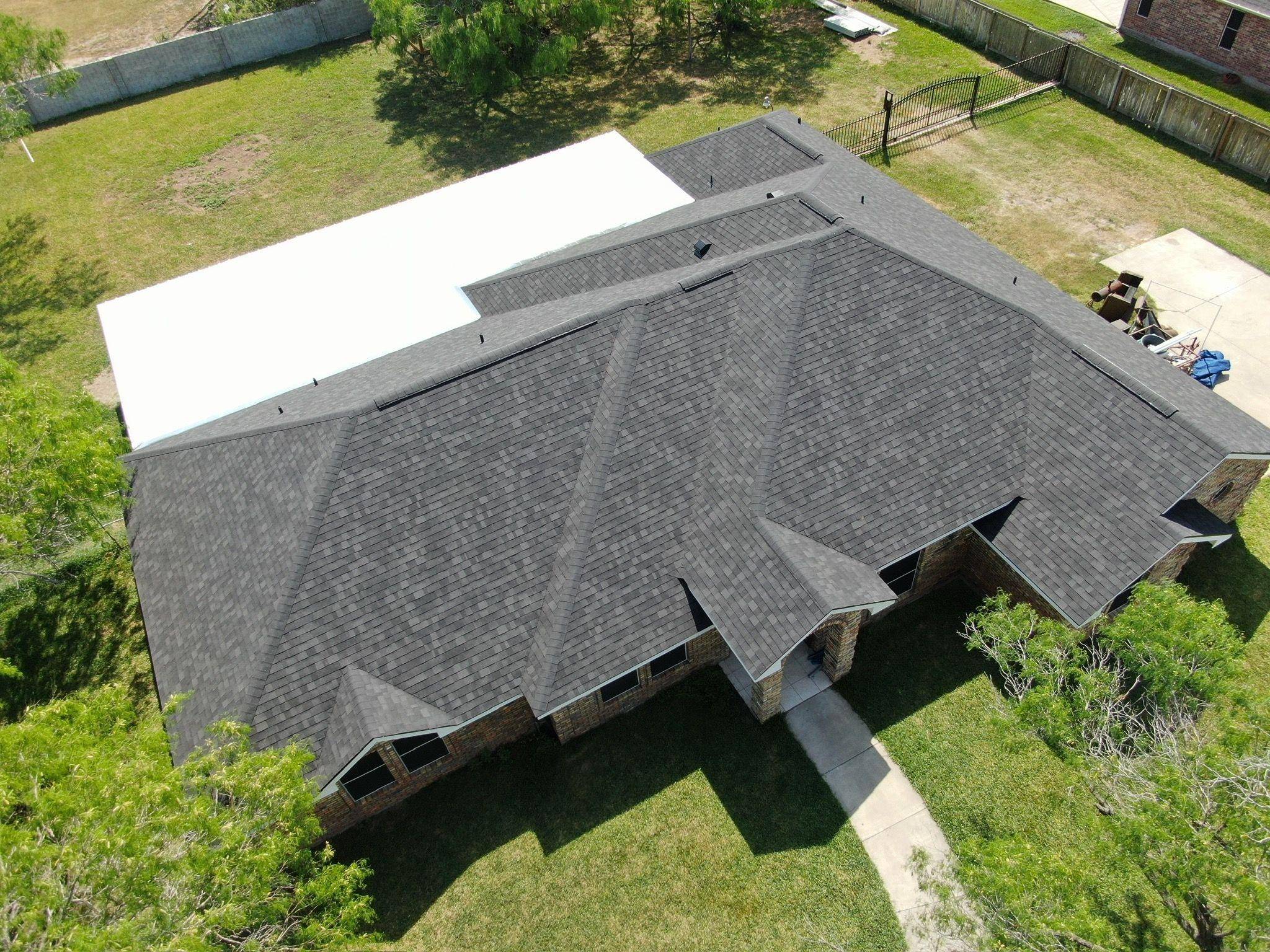 Roof inspection in McAllen Texas prior to providing a detailed roofing estimate.