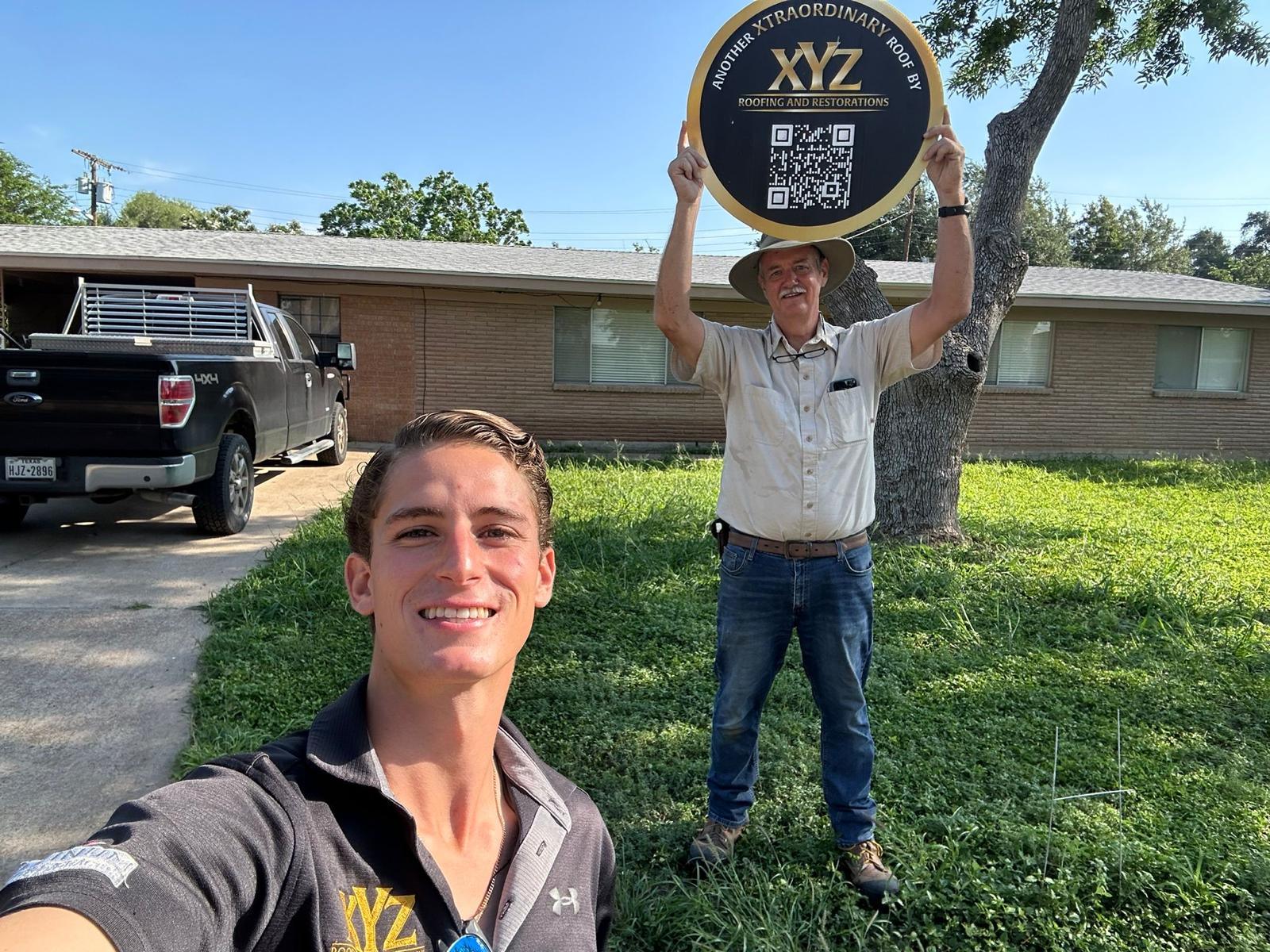 Owens Corning certified roofing installers working on a home.