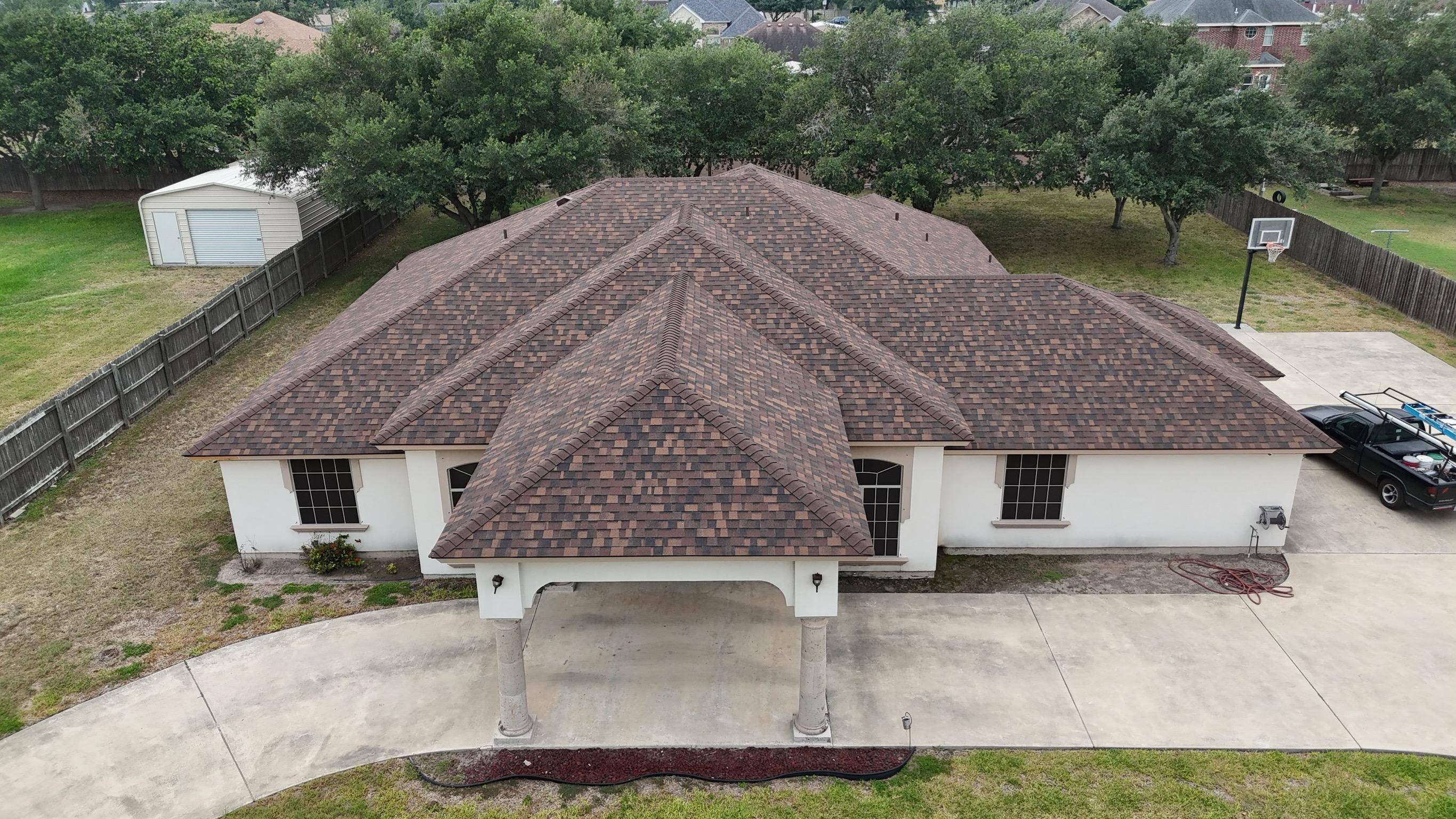 Synthetic underlayment providing waterproof protection during roof installation.