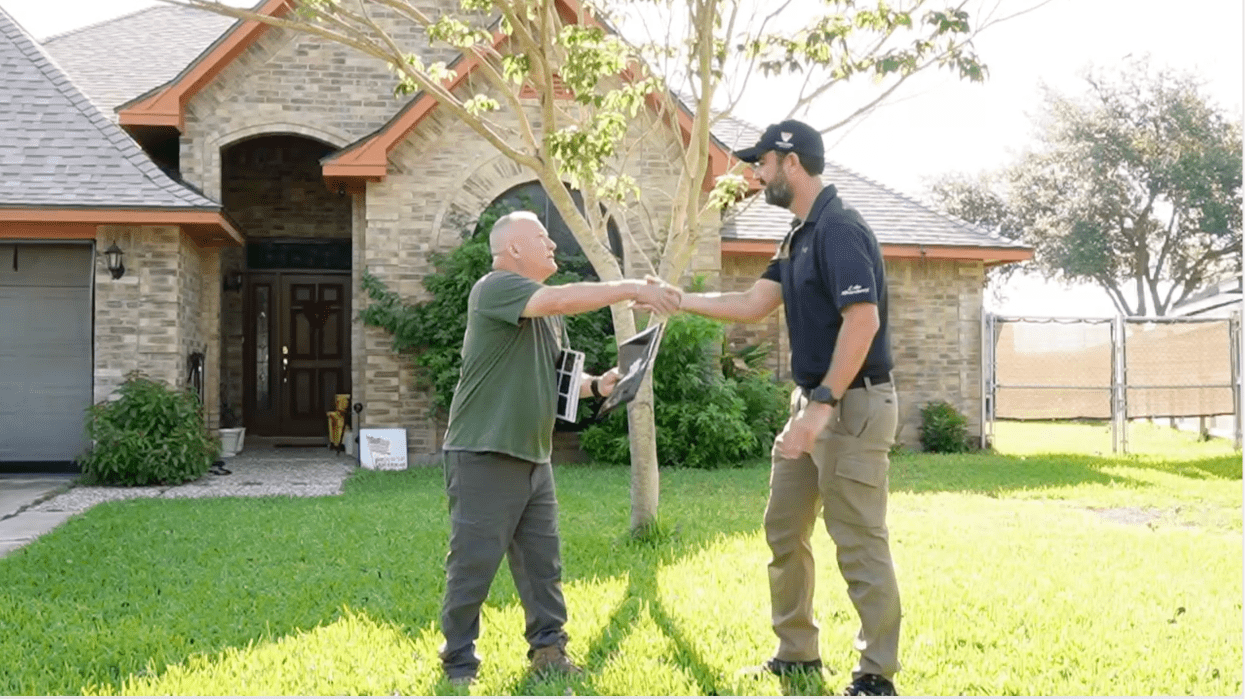Certified roofing inspector reviewing attic ventilation and moisture levels.
