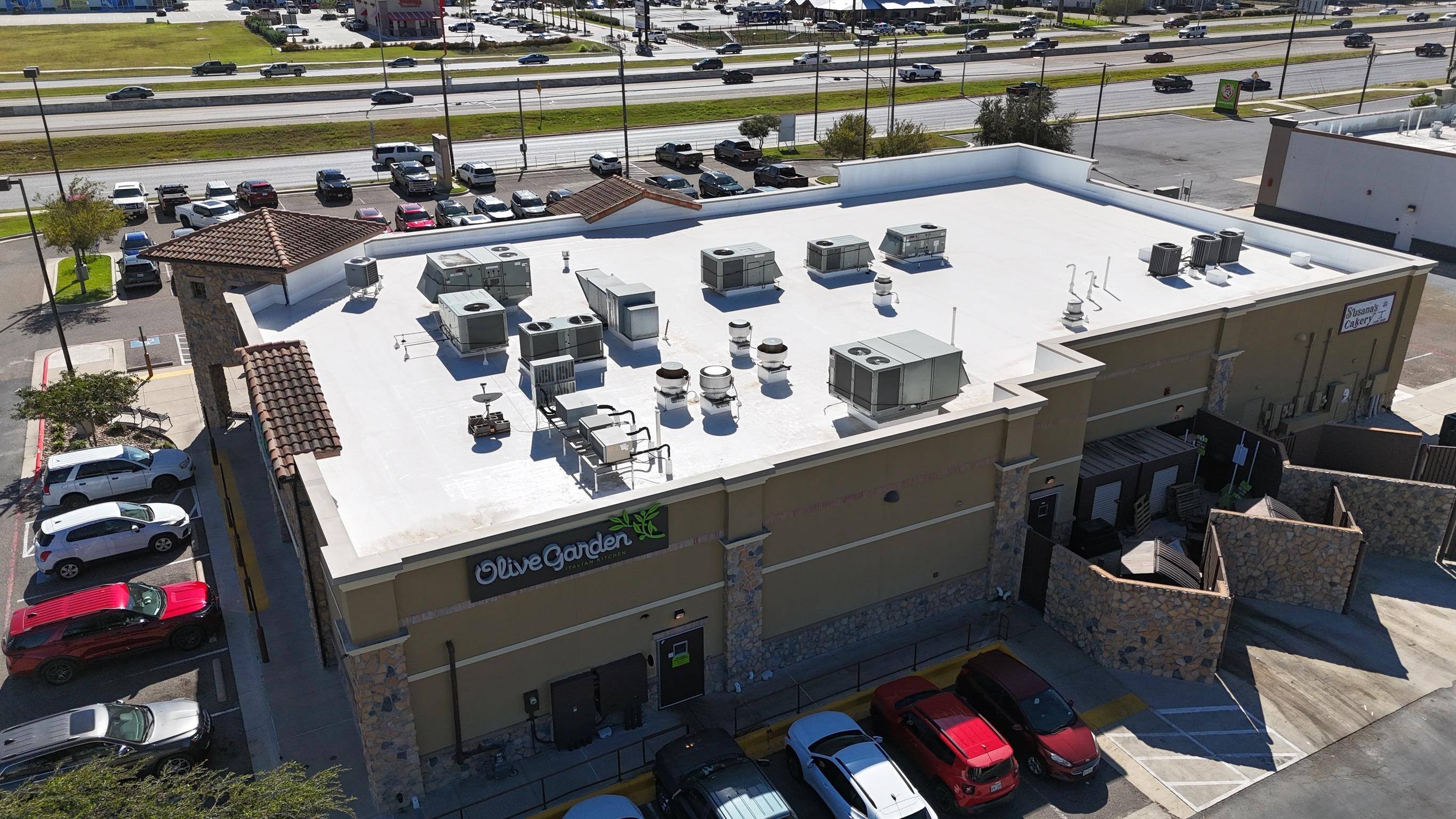 commercial flat roof with white single ply membrane