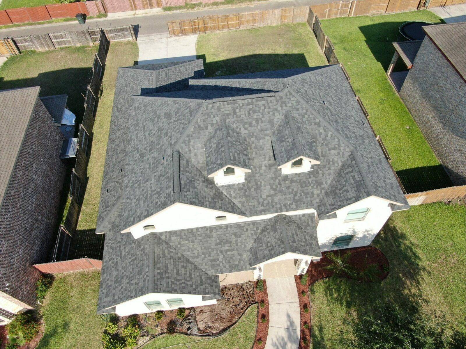 Owens Corning certified roofing installers completing high-quality roof replacement in Texas.